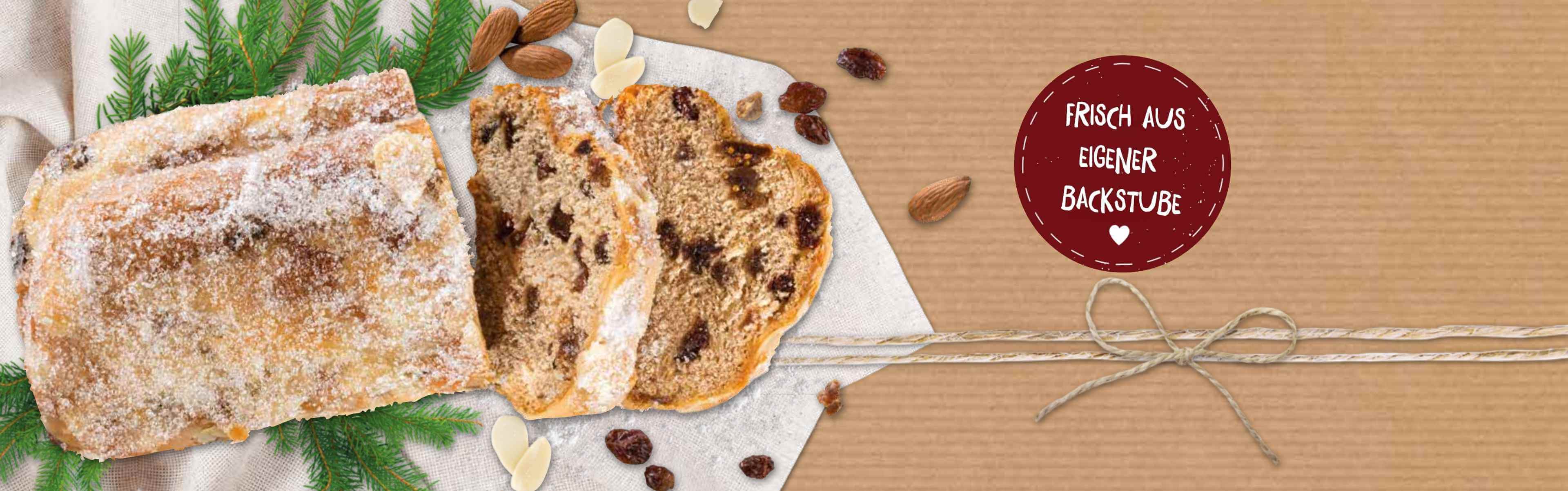 Bohlsener Mühle Stollen mit Mandeln und Rosinen auf einem Tuch.