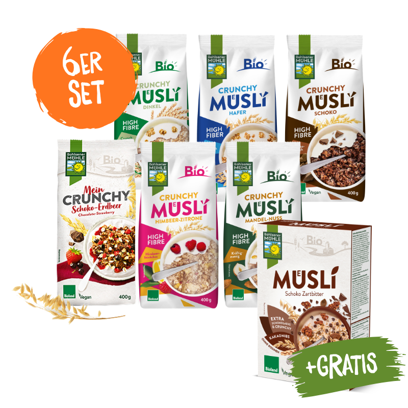 Sechs verschiedene Bohlsener Mühle Crunchy Müsli Packungen und eine Gratis-Packung Schoko Zartbitter Müsli.
