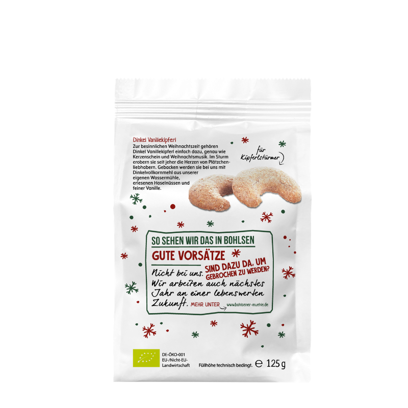 Weiße Packung Dinkel Vanillekipferl der Bohlsener Mühle mit weihnachtlichem Design und zwei abgebildeten Keksen.