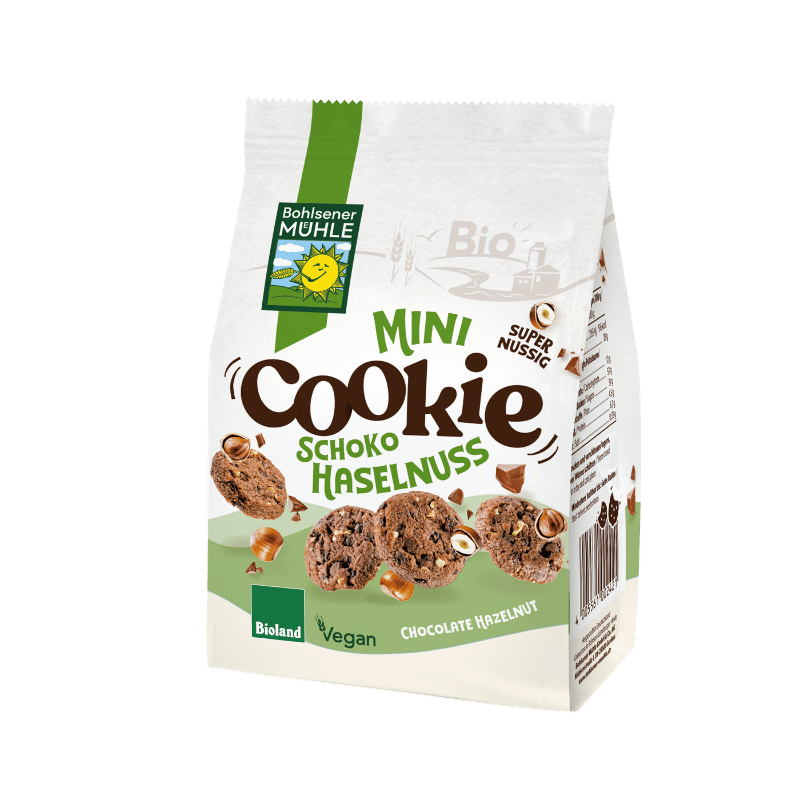 Bohlsener Mühle Mini Cookie Schoko Haselnuss in einer Verpackung mit Cookies und Haselnüssen.