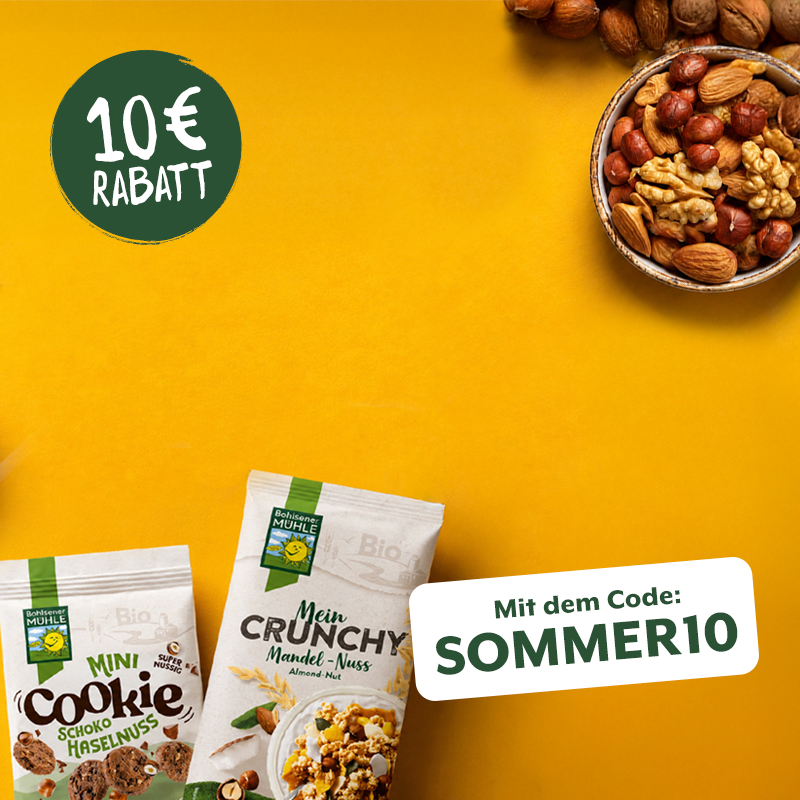 Bohlsener Mühle Mini Cookie Schoko Haselnuss und Crunchy Mandel-Nuss auf gelbem Hintergrund.