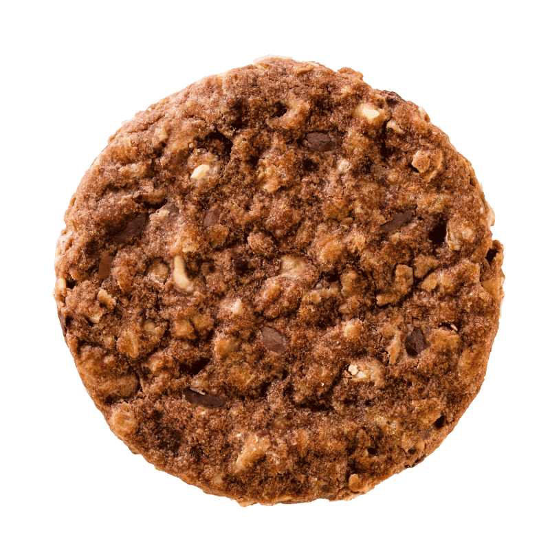 Bohlsener Mühle Crunchy Cookie mit Schokoladenstückchen auf grünem Hintergrund.