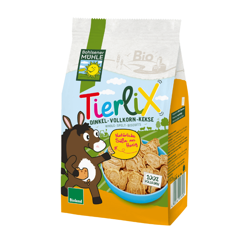 Bohlsener Mühle Tierlix Dinkel-Vollkorn-Kekse in einer Schüssel, umgeben von der Verpackung.