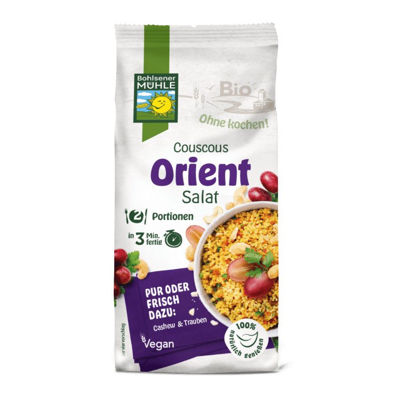 Bohlsener Mühle Couscous Orient Salat in einer Schüssel mit Trauben und Cashewkernen.