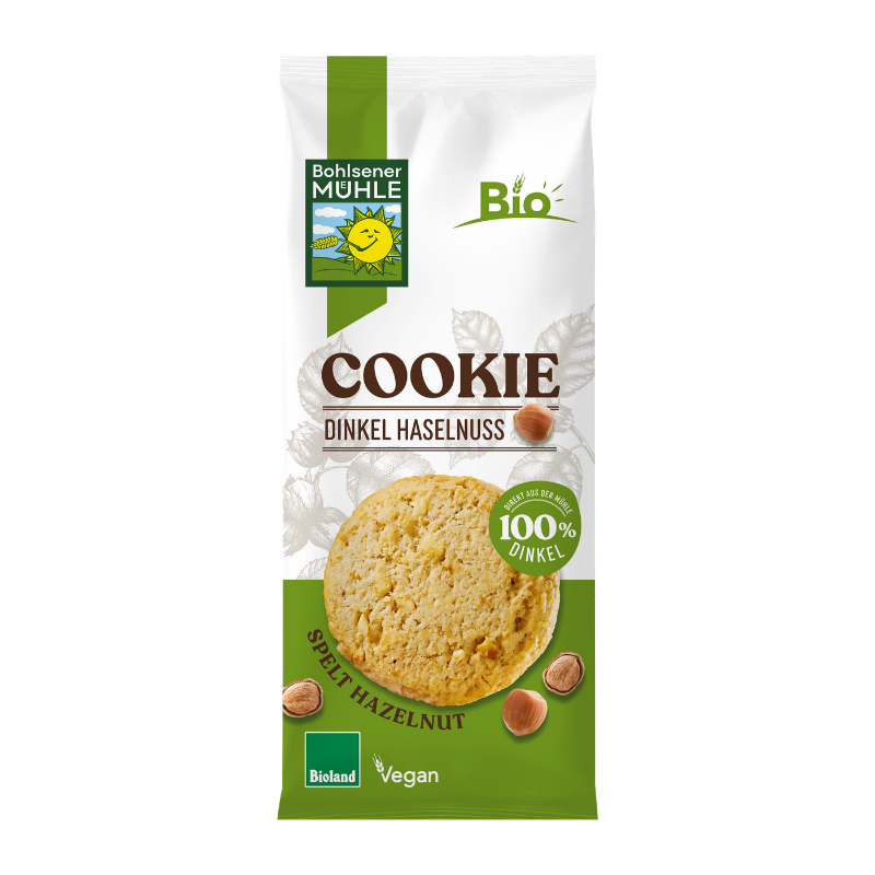 Eine Packung Bohlsener Mühle Dinkel Haselnuss Cookie mit einem runden Keks und Haselnüssen auf der Vorderseite.