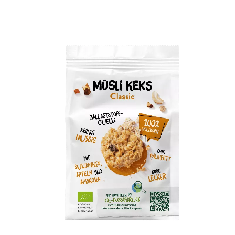 Bild vom klassischen Müsli Keks der Bohlsener Mühle. Es besteht aus Sultaninen, Äpfeln und Aprikosen und besteht zu 100 % aus Vollkorn und ohne Palmöl.