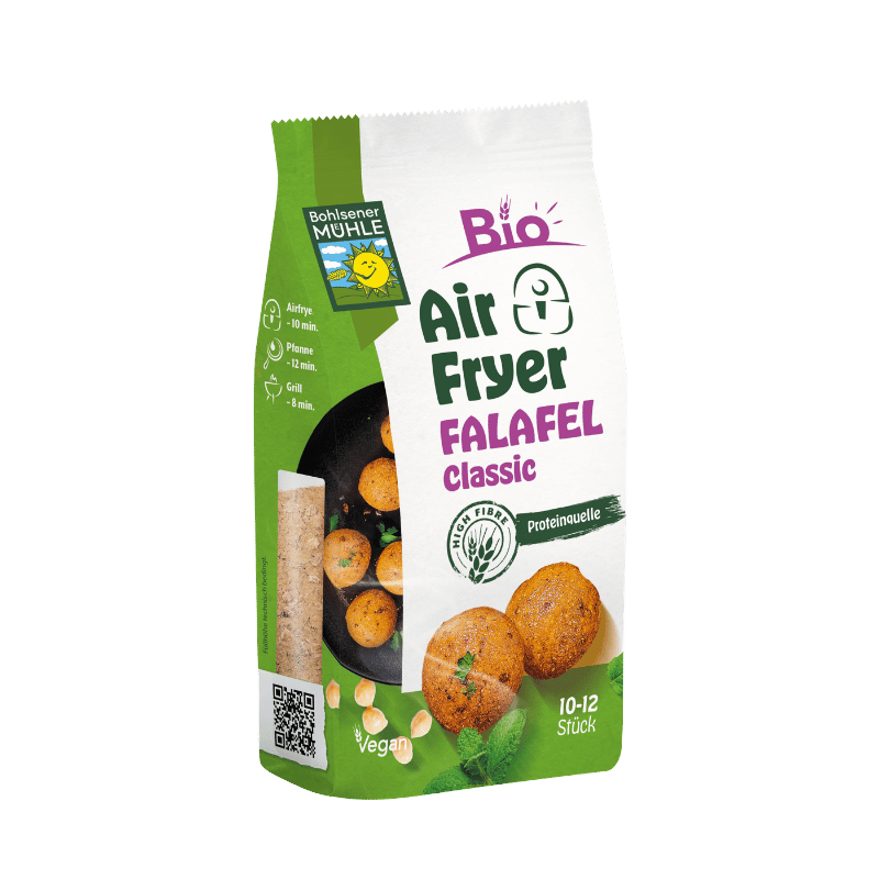 Die Packung Bohlsener Mühle Bio Air Fryer Falafel Classic zeigt knusprige Falafelbällchen auf einem schwarzen Teller.