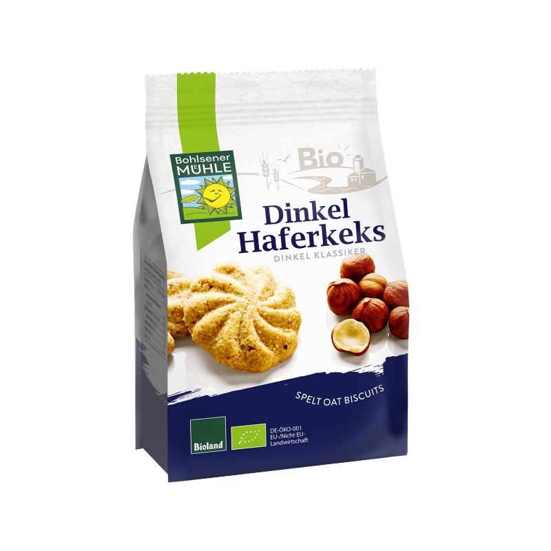 Eine Packung Bohlsener Mühle Dinkel Haferkeks mit abgebildetem Cookie und Haselnüssen auf weißem Hintergrund.