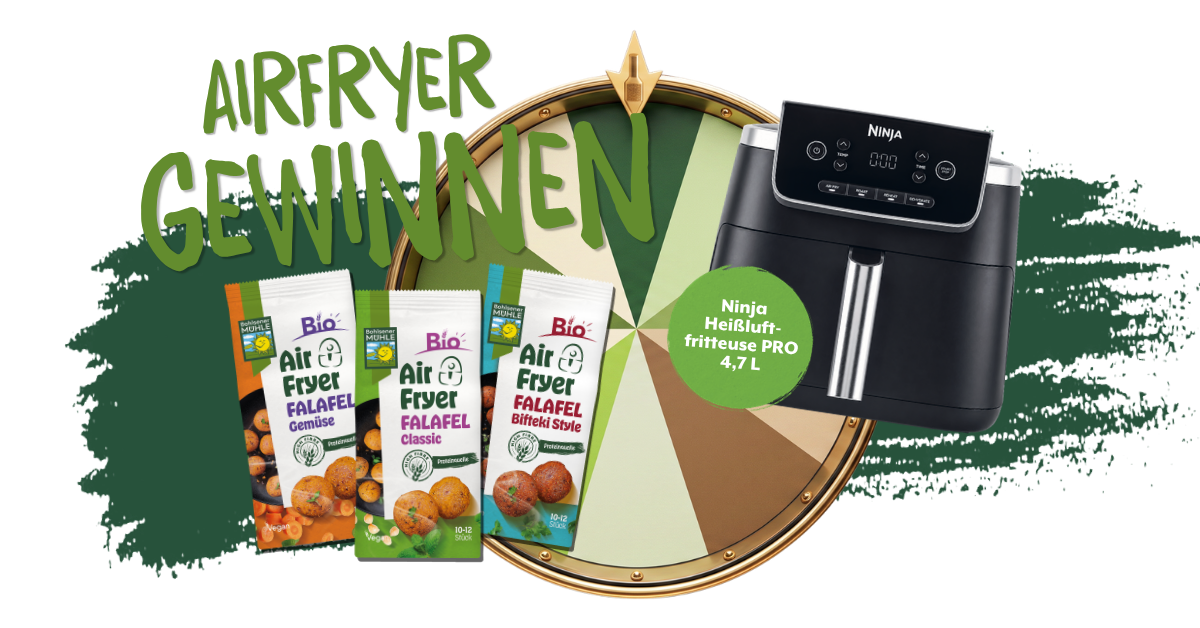 Bohlsener Mühle Air Fryer Falafel Packungen und eine Ninja Heißluftfritteuse vor einem Glücksrad.
