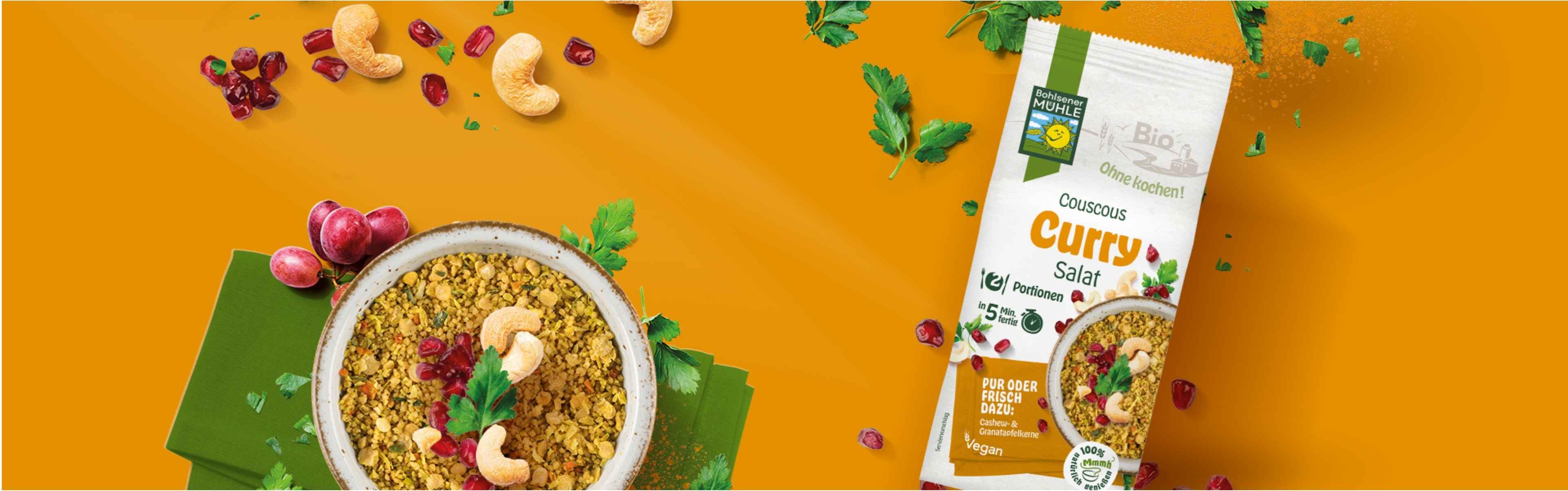 Bohlsener Mühle Couscous Curry Salat mit Cashewkernen und Granatapfelkernen.
