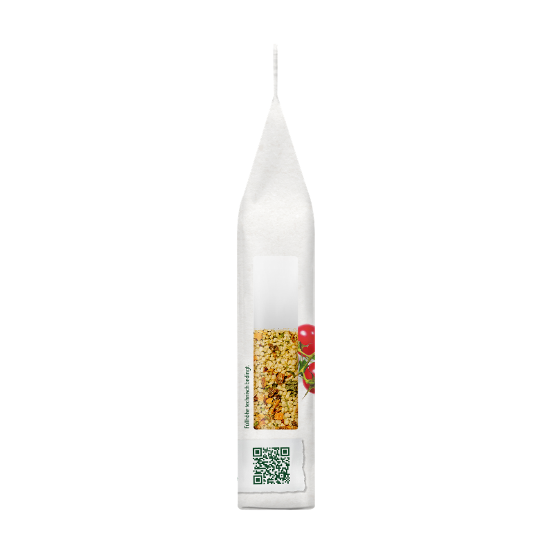 Seitenansicht der Bohlsener Mühle Tomate-Basilikum Crunchy Packung mit Sichtfenster auf die Körnermischung.