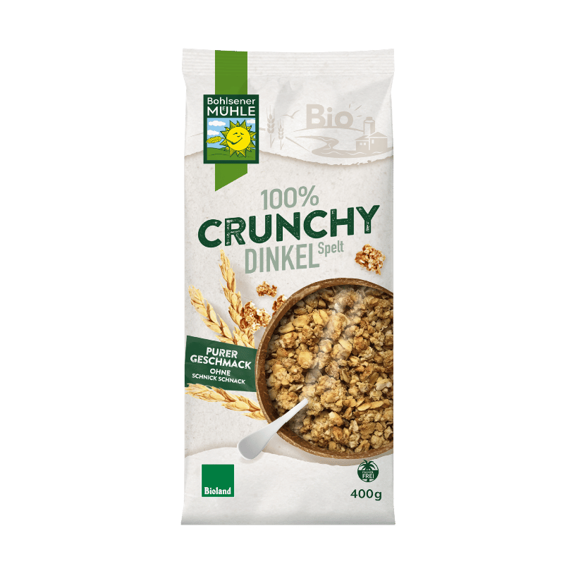 Bohlsener Mühle 100% Crunchy Dinkel in einer Schüssel mit Löffel.