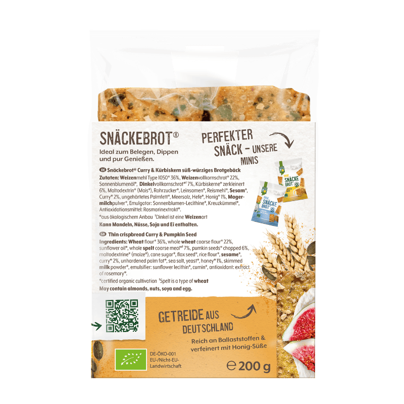 Bohlsener Mühle Snäckebrot Curry & Kürbiskern Packung mit Getreideähren, Kürbiskernen und Feigenstücken.