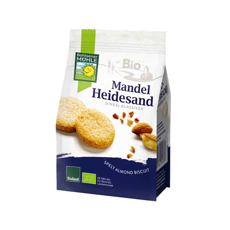 Die Packung Mandel Heidesand Dinkel Klassiker von Bohlsener Mühle zeigt runde Cookie-Kekse und ganze Mandeln.