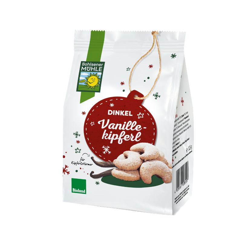 Eine weiße Packung Bohlsener Mühle Dinkel Vanillekipferl mit weihnachtlichem Design und abgebildetem Cookie-Gebäck.