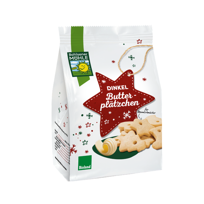 Die weiße Packung Bohlsener Mühle Dinkel Butterplätzchen zeigt weihnachtliche Keksformen und ein Stück Butter.
