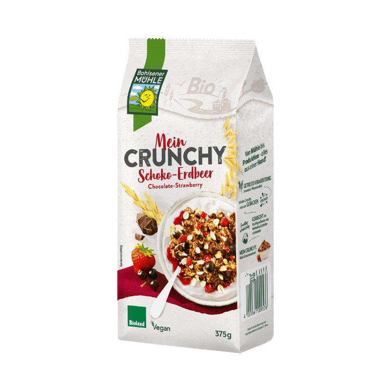 Verpackung von Bohlsener Mühle Mein Crunchy Schoko-Erdbeer mit Schüssel und Löffel.