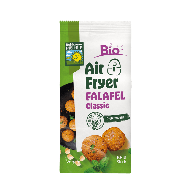 Die Packung Bohlsener Mühle Bio Air Fryer Falafel Classic zeigt gebratene Falafelbällchen auf grünem Hintergrund.