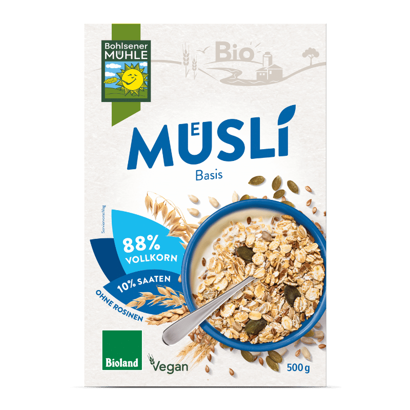 Bohlsener Mühle Bio Müsli Basis mit Haferflocken und Saaten in einer Schüssel.