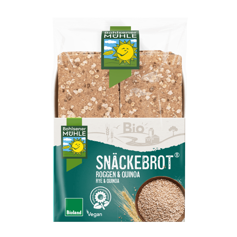 Bohlsener Mühle Snäckebrot Roggen & Quinoa in einer transparenten Verpackung mit einer Schale voller Quinoakörner.