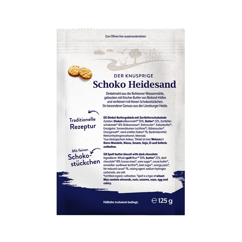 Die Packung Bohlsener Mühle Schoko Heidesand zeigt zwei runde Cookie-Stücke mit Schokostückchen auf weißem Grund.