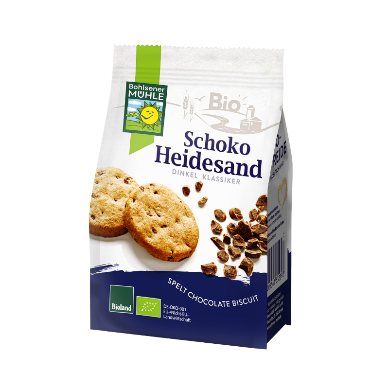 Die Packung Schoko Heidesand von Bohlsener Mühle mit Dinkel-Cookies und Schokostückchen auf weißem Hintergrund.